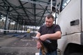 Truck driver with a package of declarations at customs