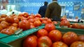 Red tomatoes in supermarket. Vegetables in farmers eco market. Retail industry. Product supply. Grocery green store. Shop. Fresh Royalty Free Stock Photo