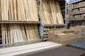 ST. PETERSBURG, RUSSIA - MARCH, 2019: Wood stacked on shelving inside a lumber yard