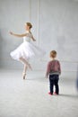 Young woman dances a solo ballet.