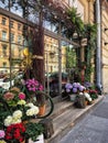 St. Petersburg, Russia - May 1, 2020,.Beautiful, bright flower shop window, door and windows with many flowers