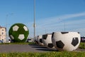 Large vases in the shape of a ball for football. Giant green soccer ball is the decoration of the city for the 2018 FIFA world Cup