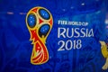 ST. PETERSBURG, RUSSIA, 02 MAY 2018: Official logo FIFA World Cup 2018 in Russia printed on a blue background, inside of