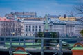 ST. PETERSBURG, RUSSIA, 17 MAY 2018: Outdoor view of unidentified man wearing uniform with an old artillery guns near