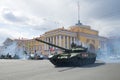 Russian T-72B3 tank against the background of the Admiralty building. Fragment of the military parade in honor of the Victory Day