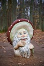 Children`s playground with sculptures of fairy-tale characters. The old man is a forest man in a hat in the form of a mushroom