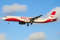 The Airbus A321-200 VP-BVO of Red Wings airline close up in the cloudy sky Royalty Free Stock Photo