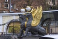 Griffins with golden wings on the Bank Bridge in St. Petersburg