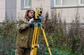 St. Petersburg,Russia-October 23,2018 -surveyor worker with theodolite