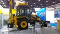 Wheel Excavator Loader JCB at an industrial exhibition. Production and supply of road construction, log handling and earthmoving e Royalty Free Stock Photo