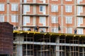 St.Petersburg. Russia -October 23,2018 : Workers are building a multi-storey house