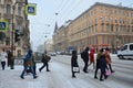 St. Petersburg, Russia, February, 26, 2018. People crossing Liteyny prospect in heavy snow in February