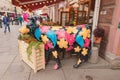 St. Petersburg, Russia - 07.11.2022: Sculpture of black cow with bright flowers on street of St. Petersburg