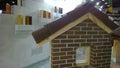 Brick house layout and samples of bricks and clinker at exhibition. Trade show. Fair Suburban Real Estate. Investor Offers.