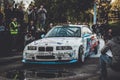BMW 3-series driftcar burning tires in drift-show Royalty Free Stock Photo