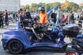 ST PETERSBURG, RUSSIA-September 26, 2020: happy biker queen on the rear seat of custom trike. Motorcyclists on their motorcycles