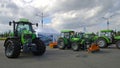 New modern tractors Deutz Fahr in agricultural machinery exhibition. Production and supply machines for farmers business.