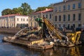 St. Petersburg, Russia - September 24, 2017: Work to deepen the bottom in the channel of the urban river Moika.