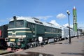 ST. PETERSBURG, RUSSIA. A view of a locomotive of DM62-1731 and the fighting railway missile system with the intercontinental bal Royalty Free Stock Photo