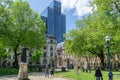 St Phillips cathedral gardens and large glass tower in Birmingham