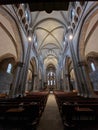 St Pierre Cathedral, Geneva, interior, with striking tall columns, empty, old architecture Royalty Free Stock Photo