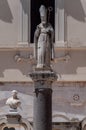 Italy. Bari. San Sabino. 17th century statue on granite column in the courtyard of the Archbishop's Palace