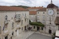 St. Sebastian s Church and the Town Clock Tower in the ancient square of Trogir Royalty Free Stock Photo