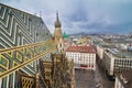 St. Stephen`s Cathedral in Wien, panorama view of city centre from south tower Steffl, detail of glazed tile roof