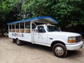 Transportation from a boat dock to a beach on an island