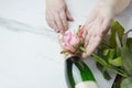 St. Valentine`s Day concept.Woman getting present for Valentine`s Day bouquet of roses.Champagne for romantic dinner Royalty Free Stock Photo