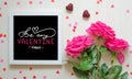 St Valentine`s Day vintage composition of white photo frame with love quote