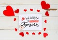 St Valentine`s Day vintage overhead composition of hearts and greeting note Royalty Free Stock Photo