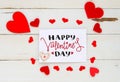 St Valentine`s Day vintage overhead composition of hearts and greeting note Royalty Free Stock Photo