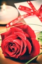 St Valentine's setting with red rose and love letter Royalty Free Stock Photo