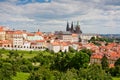 St. Vitus Cathedral over old town red roofs. Prague, Czech Republic Royalty Free Stock Photo