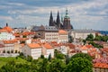 St. Vitus Cathedral over old town red roofs. Prague, Czech Republic Royalty Free Stock Photo