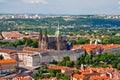 St. Vitus Cathedral over old town red roofs. Prague, Czech Republic Royalty Free Stock Photo