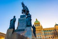 St. Wenceslas statue in Prague center. Knight on the horse near main Prague square. Museum historical building in background. One Royalty Free Stock Photo