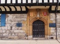 The medieval entrance door to St William`s College in York, Northern England