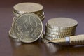 Stack of 50 cents euro coins and pen Royalty Free Stock Photo