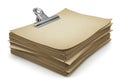 A stack of aged paper sheets held together by a metal clip suggesting notes or documents Royalty Free Stock Photo