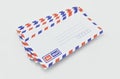 Stack of air mail envelopes on white Royalty Free Stock Photo