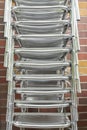 A stack of aluminum chairs