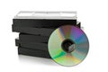 Stack of analog video cassettes with DVD disc Royalty Free Stock Photo