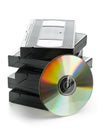 Stack of analog video cassettes with DVD disc Royalty Free Stock Photo