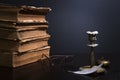 Concept still life with stack of ancient books and vintage objects Royalty Free Stock Photo
