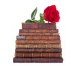 Stack of antique books and red rose Royalty Free Stock Photo