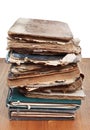 Stack antique books on wooden table