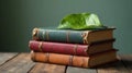 A stack of antique leather-bound books rests on a rustic wooden surface, adorned with a single vibrant green leaf. Generative AI Royalty Free Stock Photo
