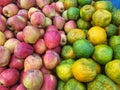 Stack of apples and oranges for sale at market Royalty Free Stock Photo